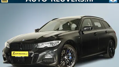 Zwart (metallic) Occasion 2021 BMW 330e M Sport Stationwagen | € 32.900 (Eerlijke prijs)