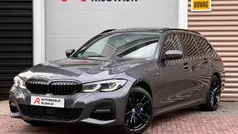 Grijs Gebruikt 2021 BMW 330e Executive Stationwagen | € 36.950 (Eerlijke prijs)