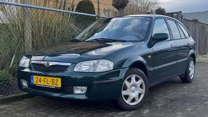 Occasion Mazda 323 89 PK (65 kW) 2000 Groen (metallic) Hatchback