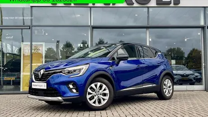 Twotone bleu iron / noir étoilé rqh+gne (blauw metallic) Gebruikt 2021 Renault Captur Intens SUV | € 22.950 (Eerlijke prijs)