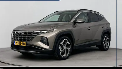 Silky bronze metallic (b6s) Gebruikt 2022 Hyundai Tucson Premium SUV | € 33.900 (Eerlijke prijs)