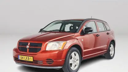Oranje Gebruikt 2010 Dodge Caliber Hatchback | € 2.750 (Eerlijke prijs)