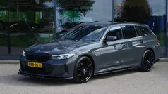 Grijs Gebruikt 2023 BMW 330e M Sport Stationwagen | € 47.450 (Eerlijke prijs)