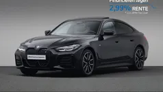 Saphirschwarz metallic (donker zwart metallic) Gebruikt 2024 BMW i4 Comfort Edition Sedan | € 48.880 (Goede deal)