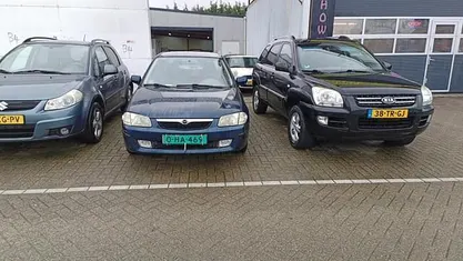 Occasion Mazda 323 88 PK (64 kW) 1999 Blauw Sedan
