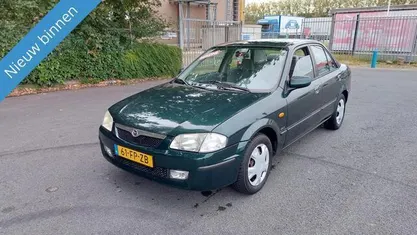 Occasion Mazda 323 88 PK (64 kW) 2000 Groen Sedan
