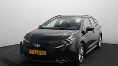 Zwart Gebruikt 2023 Toyota Corolla Hybrid Active Stationwagen | € 24.845 (Goede deal)