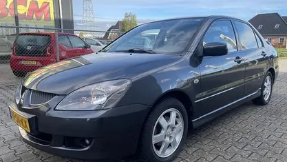 Grijs (metallic) Gebruikt 2006 Mitsubishi Lancer Sedan | € 1.999 (Eerlijke prijs)