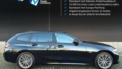 Zwart Occasion 2022 BMW 320e Sport Line Stationwagen | € 29.990 (Goede deal)