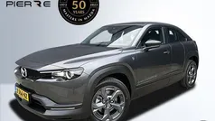 Machine gray (grijs metallic) Gebruikt 2023 Mazda MX30 Exclusive-Line SUV | € 27.845 (Eerlijke prijs)