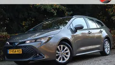 Bruin Gebruikt 2023 Toyota Corolla Hybrid Active Stationwagen | € 23.400 (Goede deal)