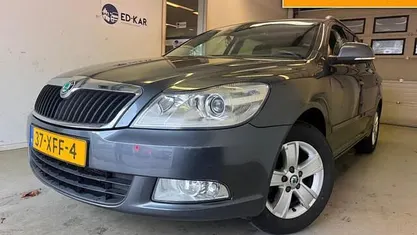 Occasion Skoda Octavia Business Line 105 PK (77 kW) 2012 Grijs Stationwagen