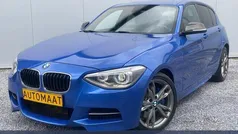 Blauw Gebruikt 2014 BMW M135 Executive Hatchback | € 21.950 (Super prijs)