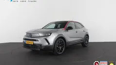 Grijs Gebruikt 2022 Opel Mokka-e GS Line SUV | € 19.950 (Eerlijke prijs)