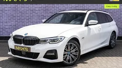 Wit Gebruikt 2022 BMW 330e Executive Stationwagen | € 38.894 (Eerlijke prijs)