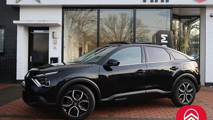 Occasion Citroën e-C4 Business Class 100 kW (136 PK) 2022 Zwart (parellak) Hatchback