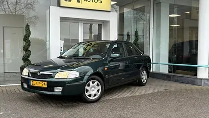 Occasion Mazda 323 89 PK (65 kW) 1999 Groen Sedan