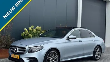 Grijs Occasion 2018 Mercedes E220 AMG Sedan | € 25.995 (Goede deal)