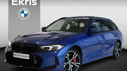 Blauw Occasion 2024 BMW 330e M Sport Stationwagen | € 43.900 (Goede deal)