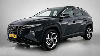 Zwart (metallic) Gebruikt 2022 Hyundai Tucson Premium SUV | € 29.945 (Eerlijke prijs)