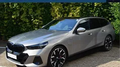 Grijs Gebruikt 2025 BMW 550e M Sport Stationwagen | € 99.950 (Goede deal)
