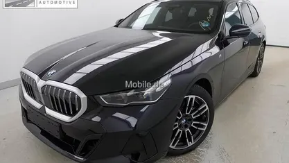 Gebruikt 2024 BMW 520 M Sport Stationwagen | € 67.895 (Eerlijke prijs)