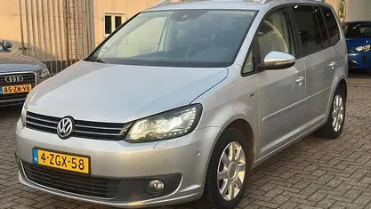 Grijs Occasion 2013 VW Touran Highline MPV | € 9.999 (Eerlijke prijs)