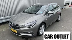 Bruin, metallic lak Gebruikt 2016 Opel Astra Business Stationwagen | € 6.650 (Eerlijke prijs)