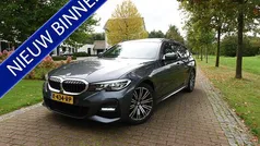 Grijs Gebruikt 2021 BMW 320 Executive Stationwagen | € 27.950 (Eerlijke prijs)