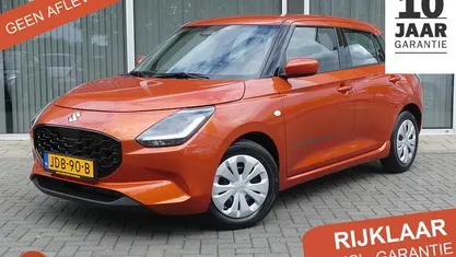 Oranje Occasion 2025 Suzuki Swift Comfort Hatchback | € 19.750 (Eerlijke prijs)