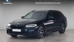 Zwart Gebruikt 2023 BMW 520 M Sport Stationwagen | € 49.950 (Goede deal)