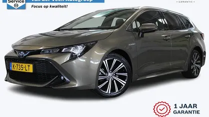 Bruin Gebruikt 2021 Toyota Corolla Business Edition Stationwagen | € 20.950 (Eerlijke prijs)