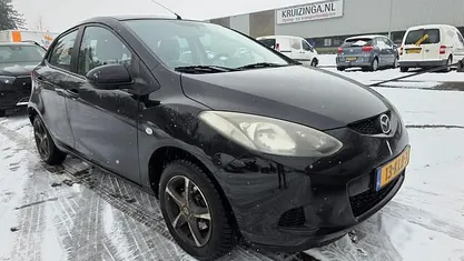 Zwart Occasion 2009 Mazda 2 Hatchback | € 1.999 (Eerlijke prijs)