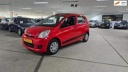 Occasion Daihatsu Cuore 69 PK (50 kW) 2008 Rood Hatchback