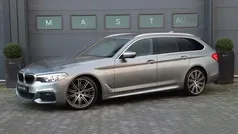 Grijs, metallic lak Gebruikt 2018 BMW 520 Executive Stationwagen | € 28.740 (Goede deal)