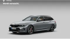 Grijs Gebruikt 2025 BMW 330e Executive Stationwagen | € 50.880 (Eerlijke prijs)
