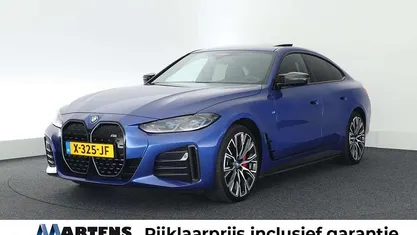 Blauw Gebruikt 2023 BMW i4 Executive Sedan | € 49.949 (Eerlijke prijs)