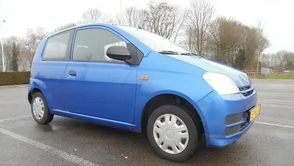 Occasion Daihatsu Cuore 59 PK (43 kW) 2009 Blauw Hatchback