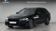 Zwart Gebruikt 2024 BMW 530e M Sport Stationwagen | € 52.950 (Eerlijke prijs)