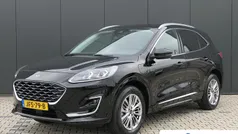 Zwart Gebruikt 2022 Ford Kuga Vignale SUV | € 28.935 (Eerlijke prijs)