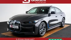 Grijs Gebruikt 2023 BMW i4 Comfort Edition Sedan | € 44.950 (Eerlijke prijs)