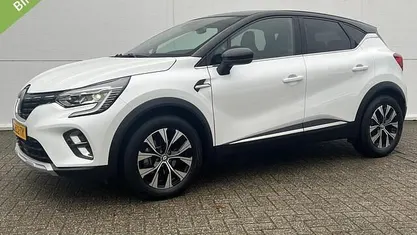 Wit nacre met dak in sterzwart Occasion 2023 Renault Captur Techno SUV | € 24.835 (Eerlijke prijs)