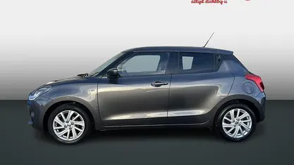 Grijs (metallic) Gebruikt 2024 Suzuki Swift Hatchback | € 17.950 (Eerlijke prijs)