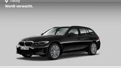 Zwart Gebruikt 2021 BMW 320e Executive Stationwagen | € 29.880 (Eerlijke prijs)