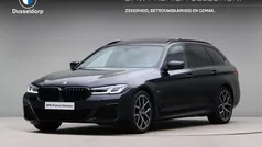 M carbonschwarz metallic (donker zwart metallic) Gebruikt 2024 BMW 530e Comfort Edition Stationwagen | € 51.250 (Eerlijke prijs)