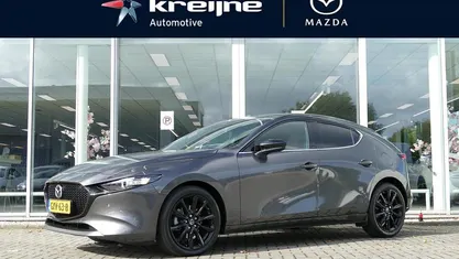 Machine grey Occasion 2024 Mazda 3 Nagisa Hatchback | € 32.925 (Eerlijke prijs)