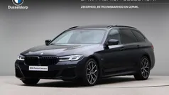 Zwart Gebruikt 2024 BMW 530e Executive Stationwagen | € 54.750 (Eerlijke prijs)