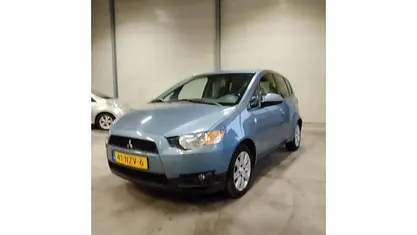 Blauw (metallic) Occasion 2011 Mitsubishi Colt Edition Hatchback | € 4.999 (Eerlijke prijs)