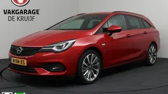 Rood, metallic lak Gebruikt 2020 Opel Astra Ultimate Stationwagen | € 18.750 (Eerlijke prijs)