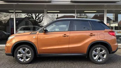 Oranje Gebruikt 2016 Suzuki Vitara Exclusive SUV | € 13.450 (Eerlijke prijs)